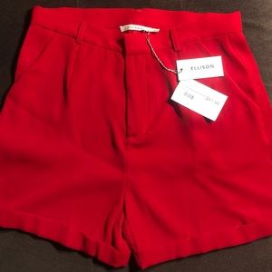 Women’s contemporary pocketed tailored shorts. Red. Size Large. Brand new.
